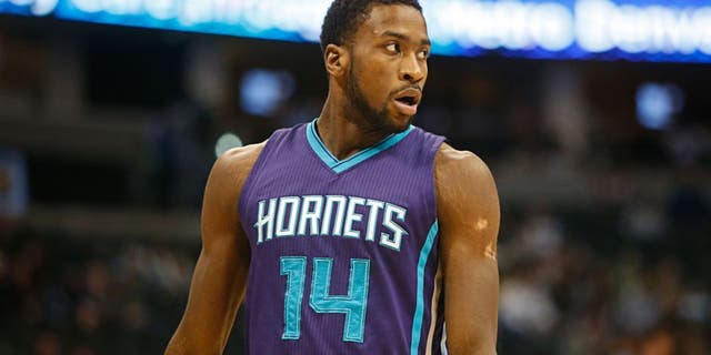 Jan 31, 2015; Denver, CO, USA; Charlotte Hornets forward Michael Kidd-Gilchrist (14) during the game against the Denver Nuggets at Pepsi Center. Mandatory Credit: Chris Humphreys-USA TODAY Sports