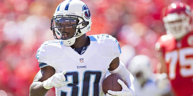 KANSAS CITY, MO - SEPTEMBER 7: Jason McCourty #30 of the Tennessee Titans runs the ball during a game against the Kansas City Chiefs at Arrowhead Stadium on September 7, 2014 in Kansas City, Missouri. The Titans defeated the Chiefs 26-10. (Photo by Wesley Hitt/Getty Images)