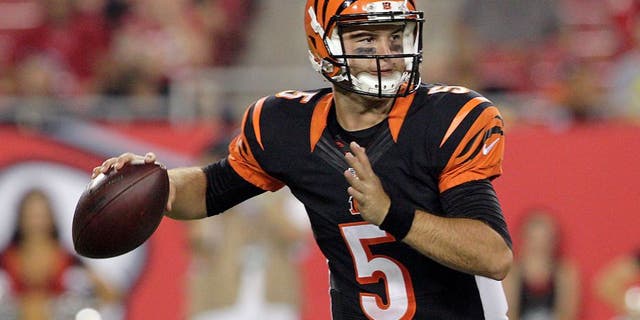Aug 24, 2015; Tampa, FL, USA; Cincinnati Bengals quarterback AJ McCarron (5) drops to throw during the second half of a preseason NFL football game at Raymond James Stadium. The Tampa Bay Buccaneers beat the Cincinnati Bengals 25-11. Mandatory Credit: Reinhold Matay-USA TODAY Sports
