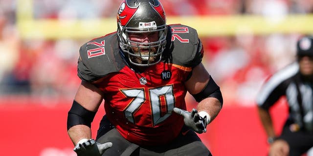 TAMPA, FL - DECEMBER 28: Logan Mankins #70 of the Tampa Bay Buccaneers blocks against the New Orleans Saints during the game at Raymond James Stadium on December 28, 2014 in Tampa, Florida. The Saints defeated the Bucs 23-20. (Photo by Joe Robbins/Getty Images)