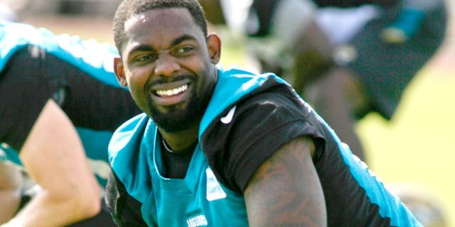May 28, 2015; Jacksonville, FL, USA; Jacksonville Jaguars wide receiver Arrelious Benn (12) smiles as he stretches during OTAs at the Florida Blue Health and Wellness Practice Fields. Mandatory Credit: Phil Sears-USA TODAY Sports