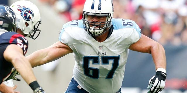 Nov 30, 2014; Houston, TX, USA; Tennessee Titans guard Andy Levitre (67) in action against the Houston Texans at NRG Stadium. Mandatory Credit: Matthew Emmons-USA TODAY Sports