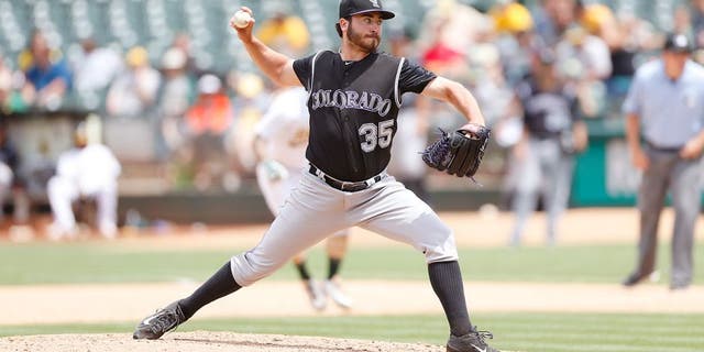 OAKLAND, CA - JULY 1: Chad Bettis #35 of the Colorado Rockies pitches during the game against the Oakland Athletics at O.co Coliseum on July 1, 2015 in Oakland, California. The Athletics defeated the Rockies 4-1. (Photo by Michael Zagaris/Oakland Athletics/Getty Images)