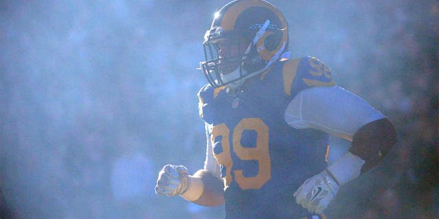 Dec 21, 2014; St. Louis, MO, USA; St. Louis Rams defensive tackle Aaron Donald (99) is introduced prior to a game against the New York Giants at the Edward Jones Dome. Mandatory Credit: Jeff Curry-USA TODAY Sports