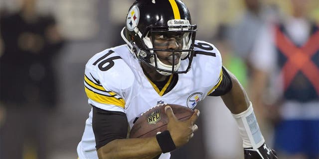 Aug 9, 2015; Canton, OH, USA; Pittsburgh Steelers receiver Tyler Murphy (16) carries the ball against the Minnesota Vikings in the 2015 Pro Football Hall of Fame game at Tom Benson Hall of Fame Stadium. Mandatory Credit: Kirby Lee-USA TODAY Sports