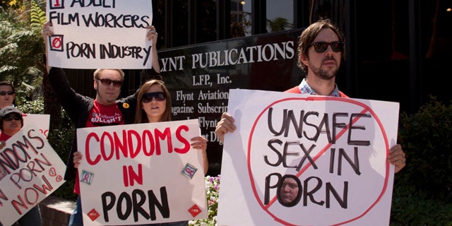 Aug. 26: Protesters came together outside porn producer - Larry Flynt's corporate headquarters today in Beverly Hills in support of complaints made to Cal/OSHA regarding the blacklist on the use of condoms in adult films.