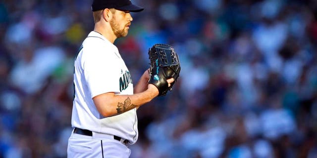 Aug 9, 2014; Seattle, WA, USA; Seattle Mariners pitcher James Paxton (65) stands on the mound against the Chicago White Sox during the sixth inning at Safeco Field. Mandatory Credit: Joe Nicholson-USA TODAY Sports