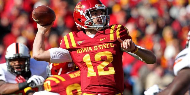 Oct 26, 2013; Ames, IA, USA; Iowa State Cyclones quarterback Sam B. Richardson (12) throws during the first quarter against the Oklahoma State Cowboys at Jack Trice Stadium. Mandatory Credit: Brace Hemmelgarn-USA TODAY Sports