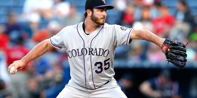 ATLANTA, GA - AUGUST 25: Chad Bettis #35 of the Colorado Rockies throws a pitch in the second inning during the game against the Atlanta Braves at Turner Field on August 25, 2015 in Atlanta, Georgia. (Photo by Mike Zarrilli/Getty Images)