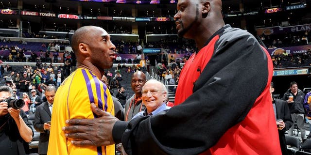 LOS ANGELES, CA - FEBRUARY 12: Former NBA player Shaquille O'Neal greets former teammate Kobe Bryant #24 of the Los Angeles Lakers before a game between the Lakers and the Phoenix Suns at Staples Center on February 12, 2013 in Los Angeles, California. NOTE TO USER: User expressly acknowledges and agrees that, by downloading and/or using this Photograph, user is consenting to the terms and conditions of the Getty Images License Agreement. Mandatory Copyright Notice: Copyright 2013 NBAE (Photo by Andrew D. Bernstein/NBAE via Getty Images)