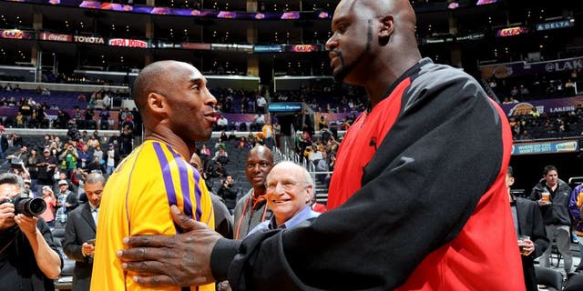 LOS ANGELES, CA - FEBRUARY 12: Former NBA player Shaquille O'Neal greets former teammate Kobe Bryant #24 of the Los Angeles Lakers before a game between the Lakers and the Phoenix Suns at Staples Center on February 12, 2013 in Los Angeles, California. NOTE TO USER: User expressly acknowledges and agrees that, by downloading and/or using this Photograph, user is consenting to the terms and conditions of the Getty Images License Agreement. Mandatory Copyright Notice: Copyright 2013 NBAE (Photo by Andrew D. Bernstein/NBAE via Getty Images)
