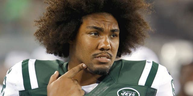 Aug 21, 2015; East Rutherford, NJ, USA; New York Jets defensive tackle Leonard Williams (62) watches game against the Atlanta Falcons from sidelines during second half at MetLife Stadium. Mandatory Credit: Noah K. Murray-USA TODAY Sports