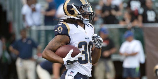 August 14, 2015; Oakland, CA, USA; St. Louis Rams running back Todd Gurley (30) warms up before a preseason NFL football game against the Oakland Raiders at O.co Coliseum. The Raiders defeated the Rams 18-3. Mandatory Credit: Kyle Terada-USA TODAY Sports
