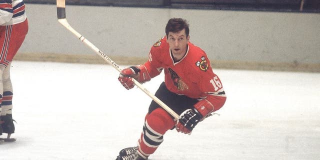 Canadian professional ice hockey player Ronald 'Chico' Maki #16 of the Chicago Blackhawks skates on the ice as an opponent looks on during a game against the New York Rangers, Madison Square Garden, New York, mid 20th Century. Maki played for Chicago from 1961 to 1976. (Photo by Melchior DiGiacomo/Getty Images)