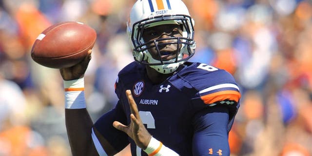 Oct 12, 2013; Auburn, AL, USA; Auburn Tigers quarterback Jeremy Johnson (6) looks to pass during the first quarter against the Western Carolina Catamounts at Jordan Hare Stadium. Mandatory Credit: Shanna Lockwood-USA TODAY Sports