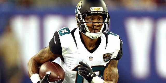 Aug 22, 2015; East Rutherford, NJ, USA; Jacksonville Jaguars wide receiver Rashad Greene (13) runs after a catch during the first half at MetLife Stadium. Mandatory Credit: Danny Wild-USA TODAY Sports