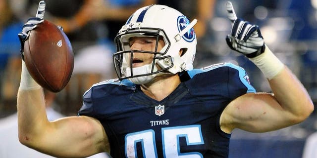 Aug 23, 2015; Nashville, TN, USA; Tennessee Titans tight end Chase Coffman (85) celebrates scoring a touchdown after catching a pass from Titans quarterback Alex Tanney (not pictured) during the second half at Nissan Stadium. Titans won 27-14. Mandatory Credit: Jim Brown-USA TODAY Sports