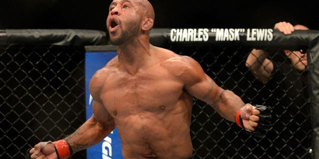 SEATTLE, WA - JULY 27: Demetrious Johnson celebrates his victory over John Moraga in their flyweight championship bout during the UFC on FOX event at Key Arena on July 27, 2013 in Seattle, Washington. (Photo by Jeff Bottari/Zuffa LLC/Zuffa LLC via Getty Images)