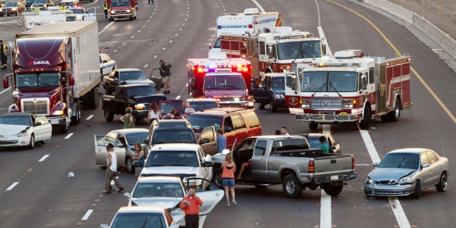 Aug. 28: This photo shows some of the vehicles involved in a multi-car accident in Phoenix. Authorities say 69 vehicles were involved in at least three separate collisions in the area.