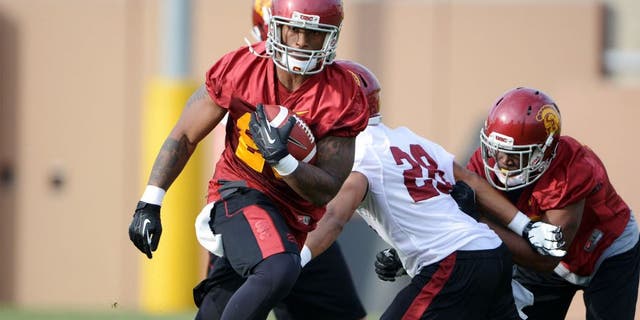 Mar 11, 2014; Los Angeles, CA, USA; Southern California Trojans tailback Tre Madden (23) at spring practice at Howard Jones Field. Mandatory Credit: Kirby Lee-USA TODAY Sports