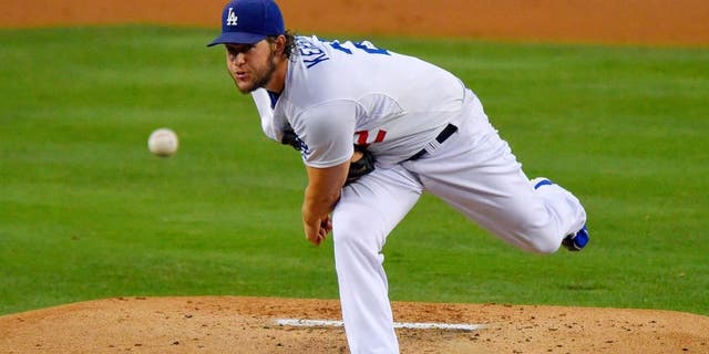 Los Angeles Dodgers starting pitcher Clayton Kershaw throws during the second inning of a baseball game against the Chicago Cubs, Friday, Aug. 28, 2015, in Los Angeles. (AP Photo/Mark J. Terrill)