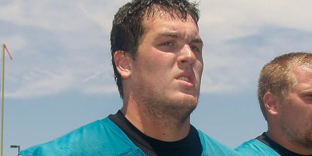 May 13, 2013; Jacksonville, FL, USA; Jacksonville Jaguars tackles R.J. Dill (74) and Jeff Nady (73) leave the field after organized team activities at The Florida Blue Health & Wellness Practice Fields. Mandatory Credit: Phil Sears-USA TODAY Sports