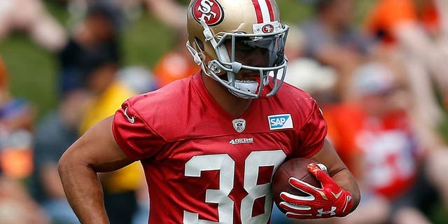 ENGLEWOOD, CO - AUGUST 27: Jarryd Hayne #38 of the San Francisco 49ers carries the ball as he works out during a joint training session with the San Francisco 49ers and the Denver Broncos at the Denver Broncos Training Facility on August 27, 2015 in Englewood, Colorado. (Photo by Doug Pensinger/Getty Images)
