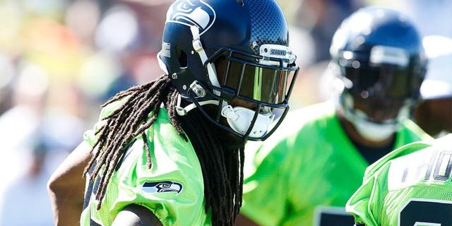 Jul 31, 2015; Renton, WA, USA; Seattle Seahawks cornerback Richard Sherman (25) participates in a drill during training camp practice at Virginia Mason Athletic Center. Mandatory Credit: Joe Nicholson-USA TODAY Sports