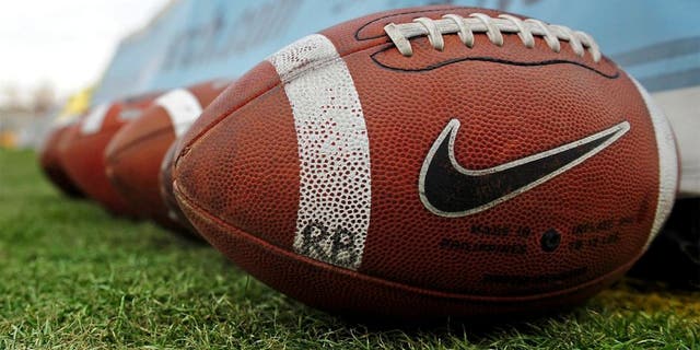 Dec. 18, 2010; Albuquerque, NM, USA; Detailed view of a Nike logo on a football prior to the game between the UTEP Miners against the BYU Cougars in the 2010 New Mexico Bowl at University Stadium. Mandatory Credit: Mark J. Rebilas-USA TODAY Sports