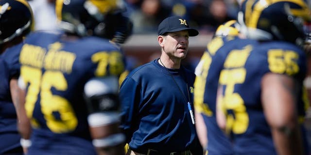 ANN ARBOR, MI - APRIL 04: Head coach Jim Harbaugh of the Michigan Wolverines looks on during the Michigan Football Spring Game on April 4, 2015 at Michigan Stadium in Ann Arbor, Michigan. (Photo by Gregory Shamus/Getty Images)