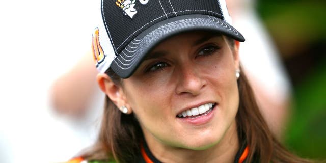 SPARTA, KY - JULY 10: Danica Patrick, driver of the #10 GoDaddy Chevrolet, looks on in the garage area during practice for the NASCAR Sprint Cup Series Quaker State 400 Presented by Advance Auto Parts at Kentucky Speedway on July 10, 2015 in Sparta, Kentucky. (Photo by Sarah Crabill/Getty Images)