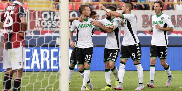 BOLOGNA, ITALY - AUGUST 29: Antonio Floro Flores # 83 of US Sassuolo Calcio celebrates with his teamates after scoring a goal during the Serie A match between Bologna FC and US Sassuolo Calcio at Stadio Renato Dall'Ara on August 29, 2015 in Bologna, Italy. (Photo by Mario Carlini / Iguana Press/Getty Images)
