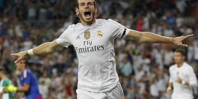 MADRID, SPAIN - AUGUST 29: Gareth Bale of Real Madrid celebrates after scoring the opening goal during the La Liga match between Real Madrid CF and Real Betis Balompie at Estadio Santiago Bernabeu on August 29, 2015 in Madrid, Spain. (Photo by Angel Martinez/Real Madrid via Getty Images)