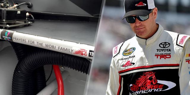 LONG POND, PA - AUGUST 01: Timothy Peters, driver of the #17 Red Horse Racing Toyota, takes part in pre-race ceremonies for the NASCAR Camping World Truck Series Pocono Mountains 150 at Pocono Raceway on August 1, 2015 in Long Pond, Pennsylvania. (Photo by Jared C. Tilton/Getty Images)