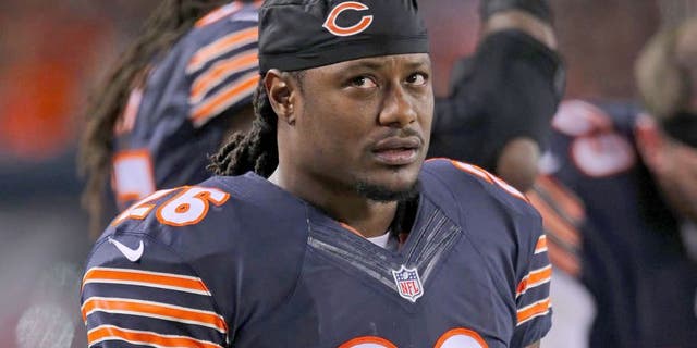 Dec 15, 2014; Chicago, IL, USA; Chicago Bears cornerback Tim Jennings (26) on the sideline during the second quarter against the New Orleans Saints at Soldier Field. Mandatory Credit: Dennis Wierzbicki-USA TODAY Sports