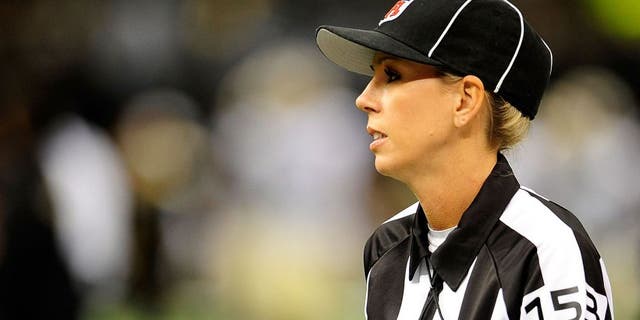 NEW ORLEANS, LA - AUGUST 16: Line judge Sarah Thomas, takes the field for a preseason game between the Oakland Raiders and the New Orleans Saints at the Mercedes-Benz Superdome on August 16, 2013 in New Orleans, Louisiana. The Saints won 28-20. (Photo by Stacy Revere/Getty Images)