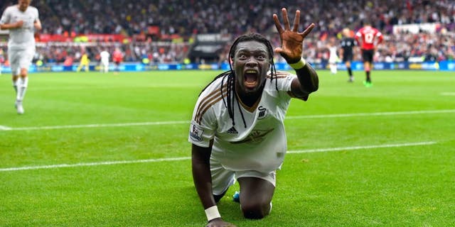 SWANSEA, WALES - AUGUST 30: Swansea striker Bafetimbi Gomis celebrates after scoring the second swansea goal during the Barclays Premier League match between Swansea City and Manchester United on August 30, 2015 in Swansea, United Kingdom. (Photo by Stu Forster/Getty Images)