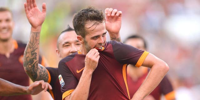 ROME, ITALY - AUGUST 30: AS Roma Player Miralem Pjanic celebrates the goal during the Serie A match between AS Roma and Juventus FC at Stadio Olimpico on August 30, 2015 in Rome, Italy. (Photo by Luciano Rossi/AS Roma via Getty Images)