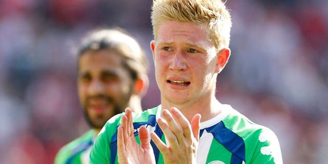 COLOGNE, GERMANY - AUGUST 22: Kevin De Bruyne of Wolfsburg claps after the Bundesliga match between 1. FC Koeln and VfL Wolfsburg at RheinEnergieStadion on August 22, 2015 in Cologne, Germany. (Photo by Mika Volkmann/Bongarts/Getty Images)