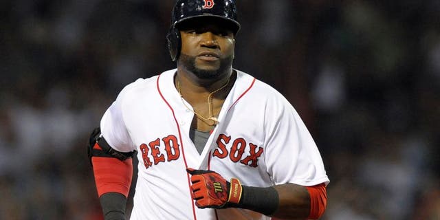 Aug 31, 2015; Boston, MA, USA; Boston Red Sox designated hitter David Ortiz (34) rounds the bases after hitting a home run during the fourth inning against the New York Yankees at Fenway Park. Mandatory Credit: Bob DeChiara-USA TODAY Sports