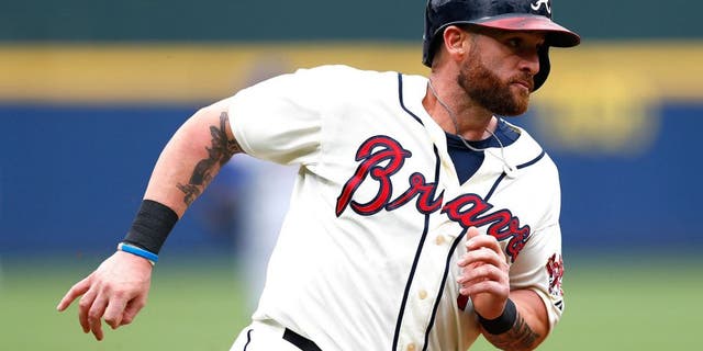 ATLANTA, GA - APRIL 12: Jonny Gomes #7 of the Atlanta Braves in action against the New York Mets during the Braves opening series at Turner Field on April 12, 2015 in Atlanta, Georgia. (Photo by Kevin C. Cox/Getty Images)