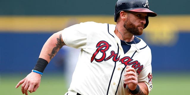 ATLANTA, GA - APRIL 12: Jonny Gomes #7 of the Atlanta Braves in action against the New York Mets during the Braves opening series at Turner Field on April 12, 2015 in Atlanta, Georgia. (Photo by Kevin C. Cox/Getty Images)