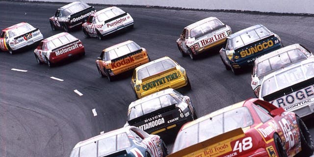 DARLINGTON, SC - SEPTEMBER 2, 1989: Greg Sacks (No. 17), Dale Earnhardt (No. 3), Morgan Shepherd (No. 15) and Derrike Cope (No. 10) lead the field during the running of the Heinz Southern 500 NASCAR Cup race at Darlington Raceway. Earnhardt went on to score the victory. (Photo by ISC Images &amp; Archives via Getty Images)