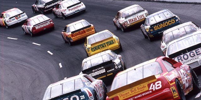 DARLINGTON, SC - SEPTEMBER 2, 1989: Greg Sacks (No. 17), Dale Earnhardt (No. 3), Morgan Shepherd (No. 15) and Derrike Cope (No. 10) lead the field during the running of the Heinz Southern 500 NASCAR Cup race at Darlington Raceway. Earnhardt went on to score the victory. (Photo by ISC Images & Archives via Getty Images)