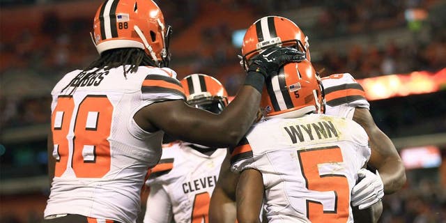 Aug 20, 2015; Cleveland, OH, USA; Cleveland Browns wide receiver Shane Wynn (5) celebrates with teammates after catching a pass for a touchdown during the fourth quarter of a preseason game against the Buffalo Bills at FirstEnergy Stadium. Mandatory Credit: Andrew Weber-USA TODAY Sports