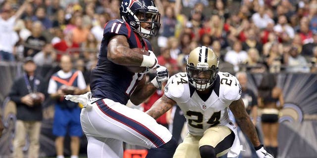 Aug 30, 2015; New Orleans, LA, USA; Houston Texans wide receiver Jaelen Strong (11) scores a touchdown in the second half of their game against the New Orleans Saints at the Mercedes-Benz Superdome. The Texans won, 27-13. Mandatory Credit: Chuck Cook-USA TODAY Sports