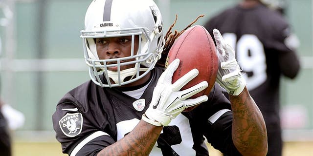 May 26, 2015; Alameda, CA, USA; Oakland Raiders running back Trent Richardson (33) catches a pass at organized team activities at the Raiders practice facility. Mandatory Credit: Kirby Lee-USA TODAY Sports