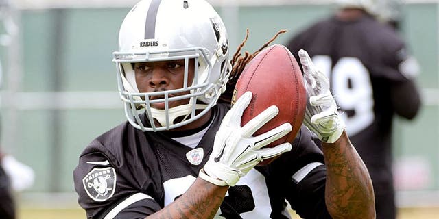 May 26, 2015; Alameda, CA, USA; Oakland Raiders running back Trent Richardson (33) catches a pass at organized team activities at the Raiders practice facility. Mandatory Credit: Kirby Lee-USA TODAY Sports
