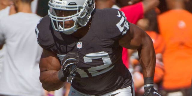 August 30, 2015; Oakland, CA, USA; Oakland Raiders outside linebacker Khalil Mack (52) warms up before a preseason NFL football game against the Arizona Cardinals at O.co Coliseum. Mandatory Credit: Kyle Terada-USA TODAY Sports