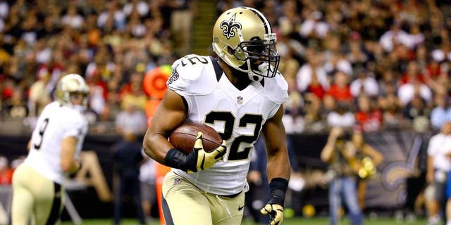 Aug 30, 2015; New Orleans, LA, USA; New Orleans Saints running back Mark Ingram (22) runs against the Houston Texans during the first quarter of a preseason game at the Mercedes-Benz Superdome. Mandatory Credit: Derick E. Hingle-USA TODAY Sports